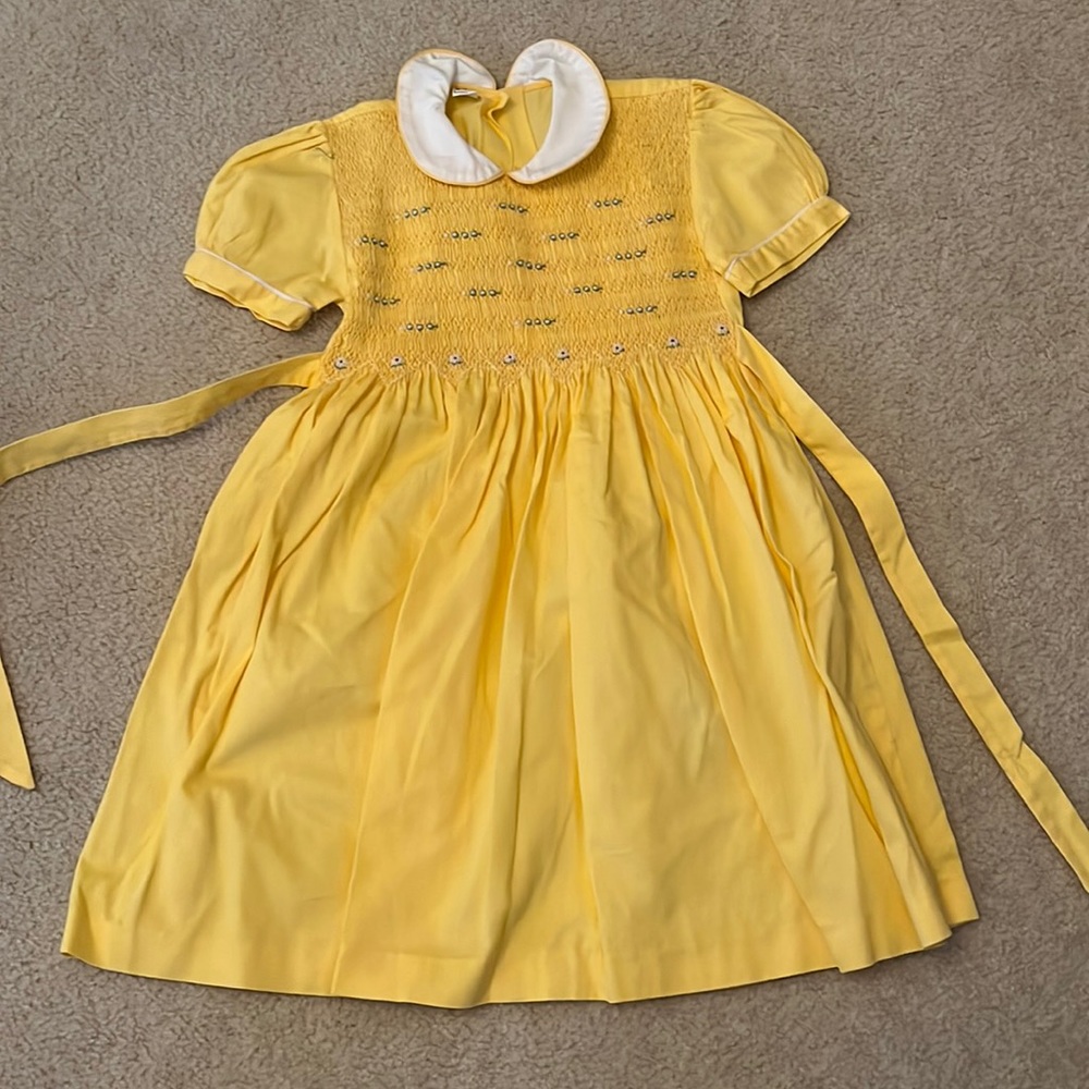 French brand Brodé Makn Madagascar, size 6 on small girls; yellow with flowers